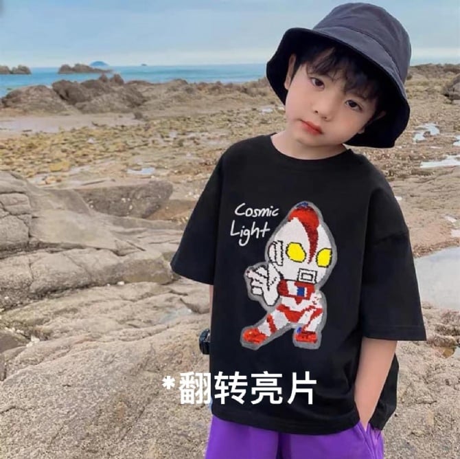 鹹蛋超人反轉亮片上衣📌顏色：黑色